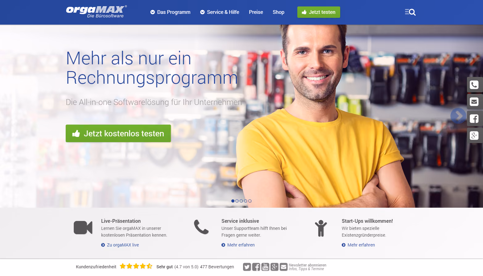 Website-Header mit orgaMAX-Logo und Navigationsmenü, Text 'Mehr als nur ein Rechnungsprogramm' und 'Die All-in-one Softwarelösung für Ihr Unternehmen', ein Mann im gelben T-Shirt lächelt vor Werkzeugregal, grüner Knopf 'Jetzt kostenlos testen', Symbole für Live-Präsentation, Service inklusive und Start-Ups willkommen, Kundenbewertung mit 4,7 von 5 Sternen.