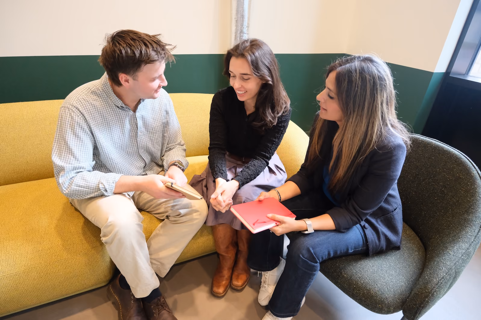 The blulotus team talking through notes together