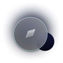 A circular gray button with a raised diamond shape in the center, casting a subtle shadow on a dark background.