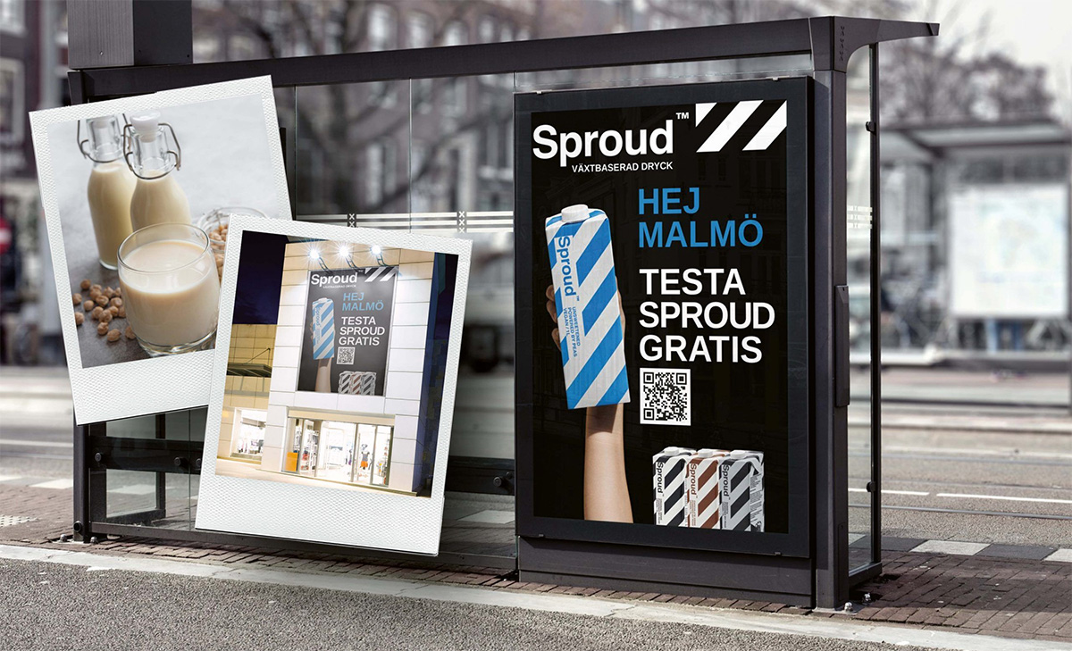 Utomhusreklam för Sproud med texten Hej Malmö, testa Sproud gratis