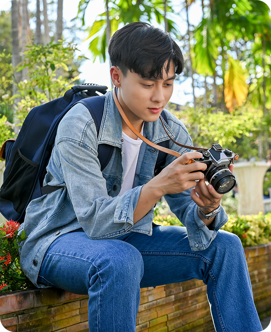 Traveller paying with a phone abroad