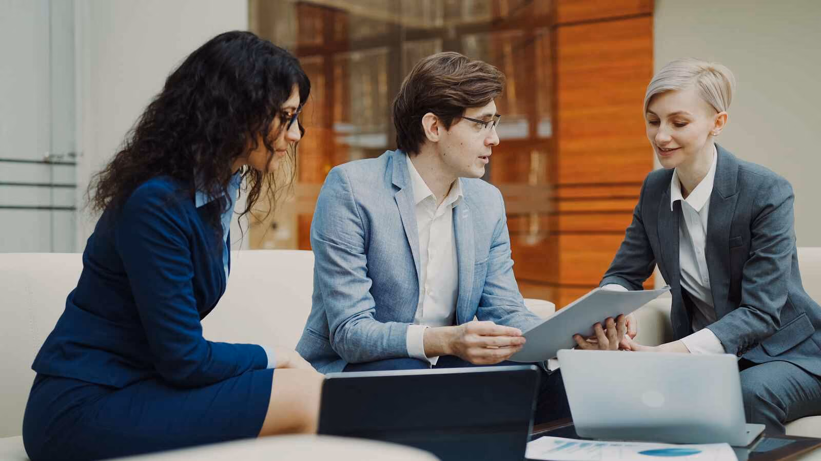 Three young woman in a business meeting