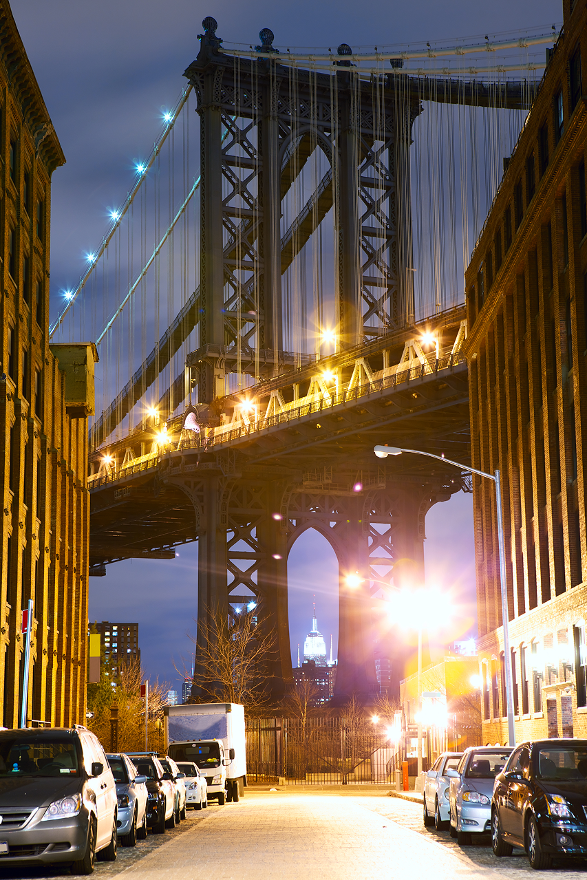 Manhattan Bridge seen from a Brooklyn street at night