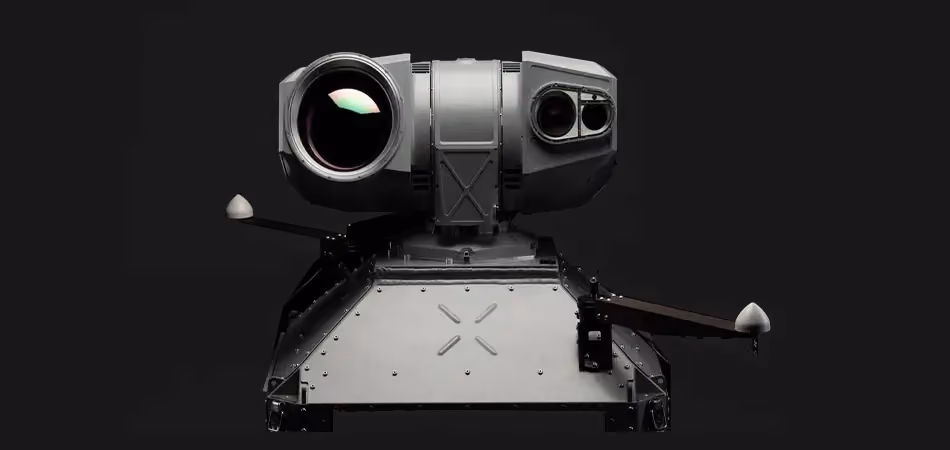 Grey vehicle with mounted EchoShield radars against a black background with grey hexagon pattern