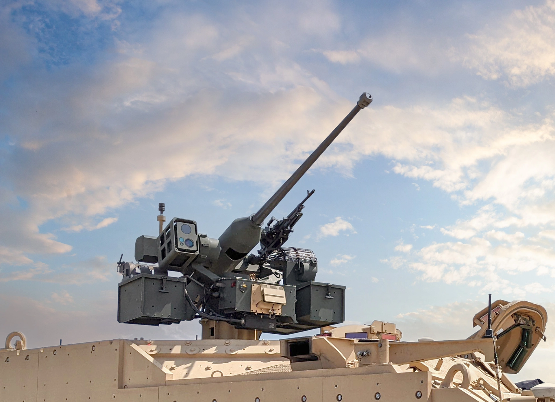 mounted EchoGuard radar system against a partly cloudy blue sky.