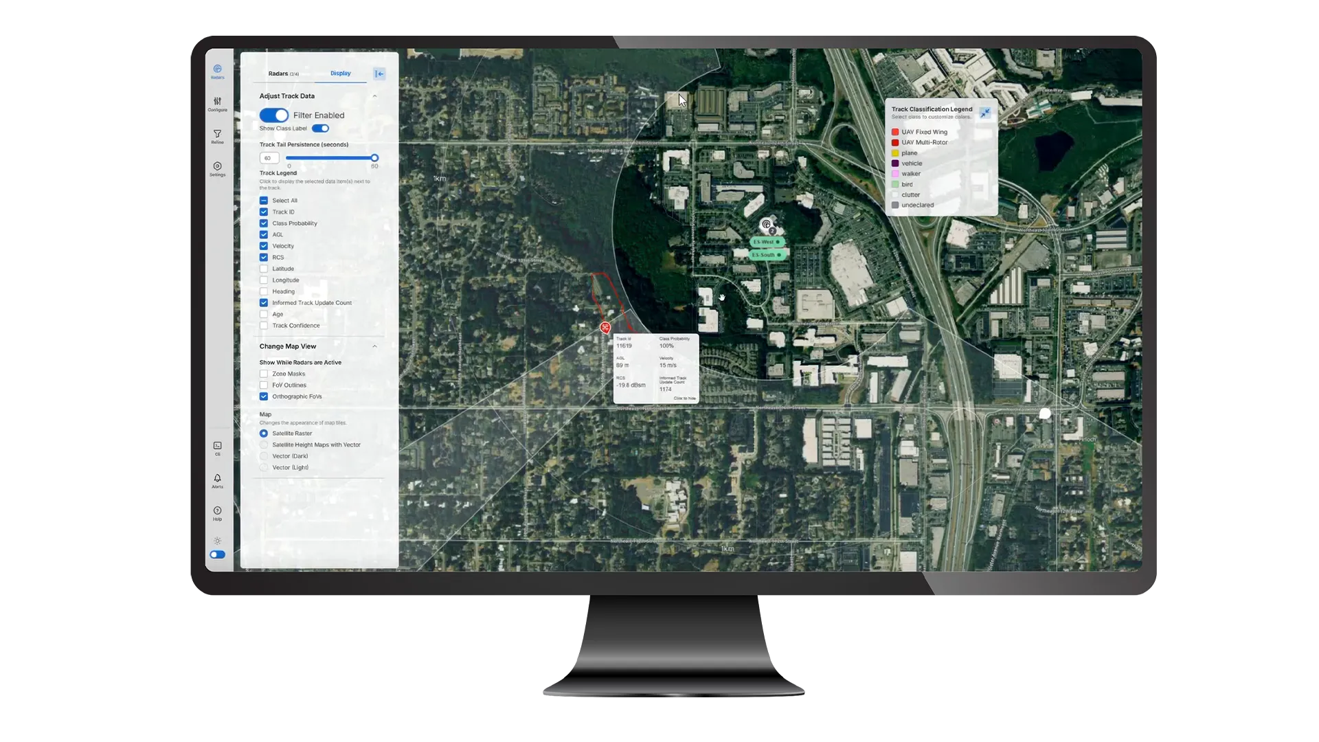 Computer monitor showing detailed satellite map with radar tracking data and classification legend.