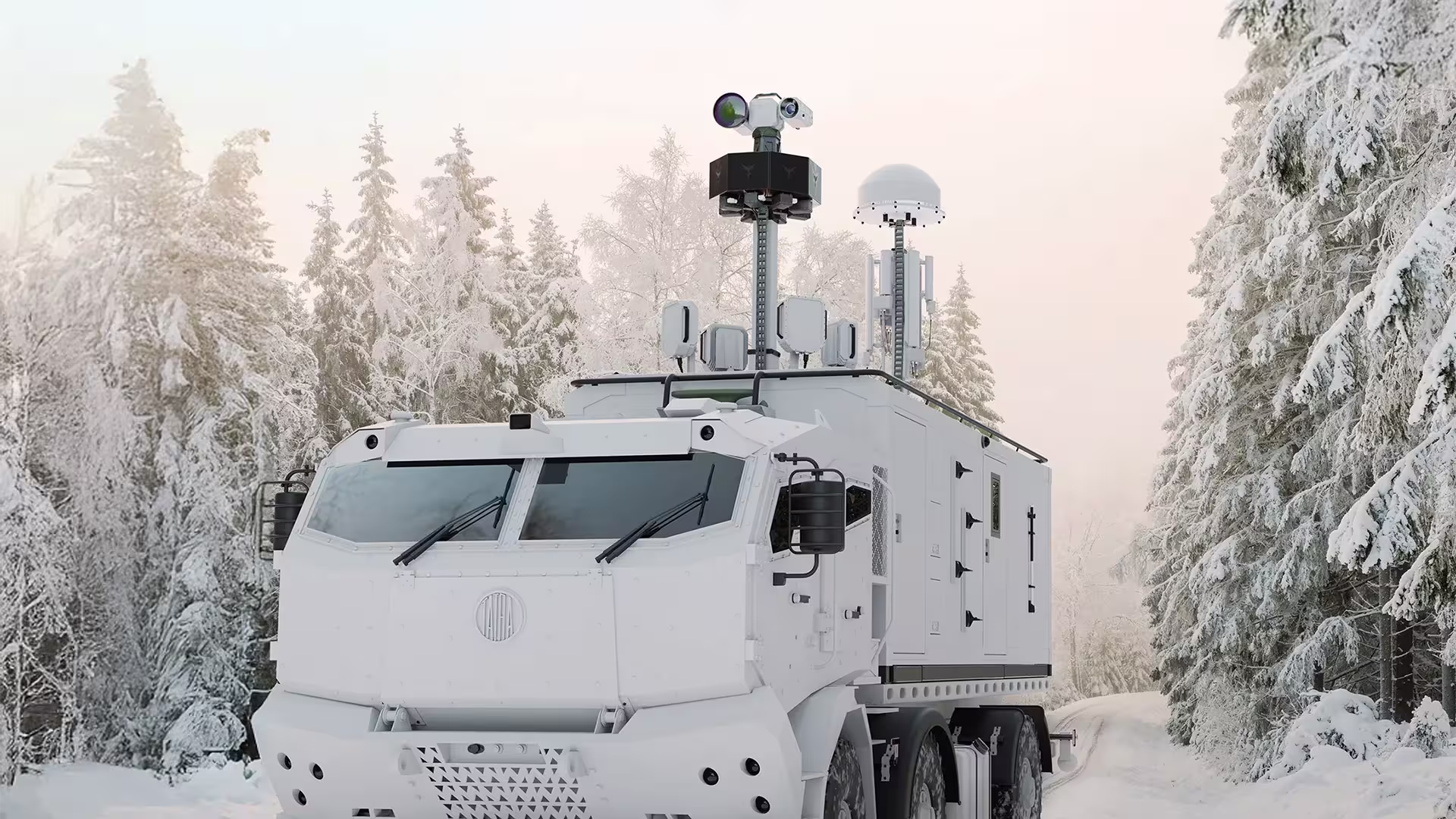White six-wheeled armored vehicle with antennae and sensors in a snowy forest path.