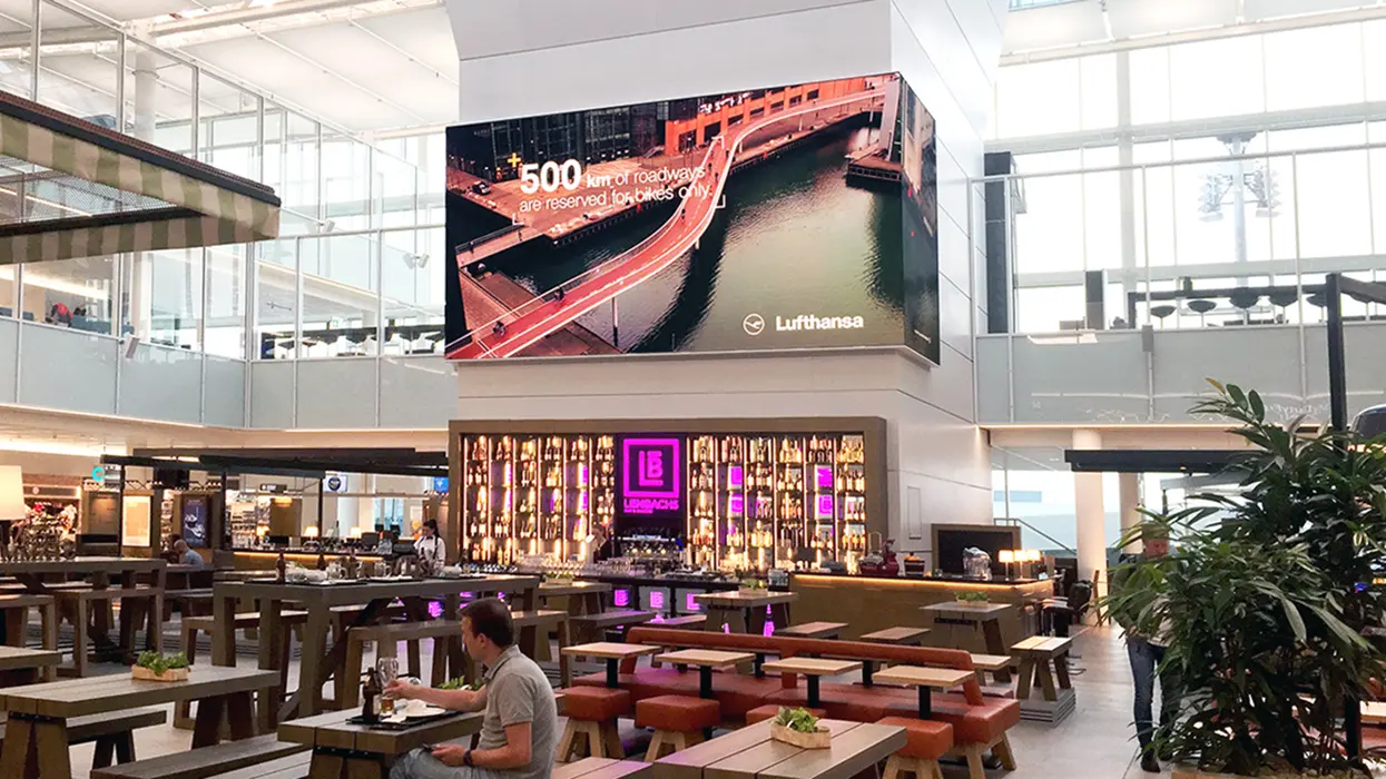 LED installation above a bar in a Munich Airport terminal.