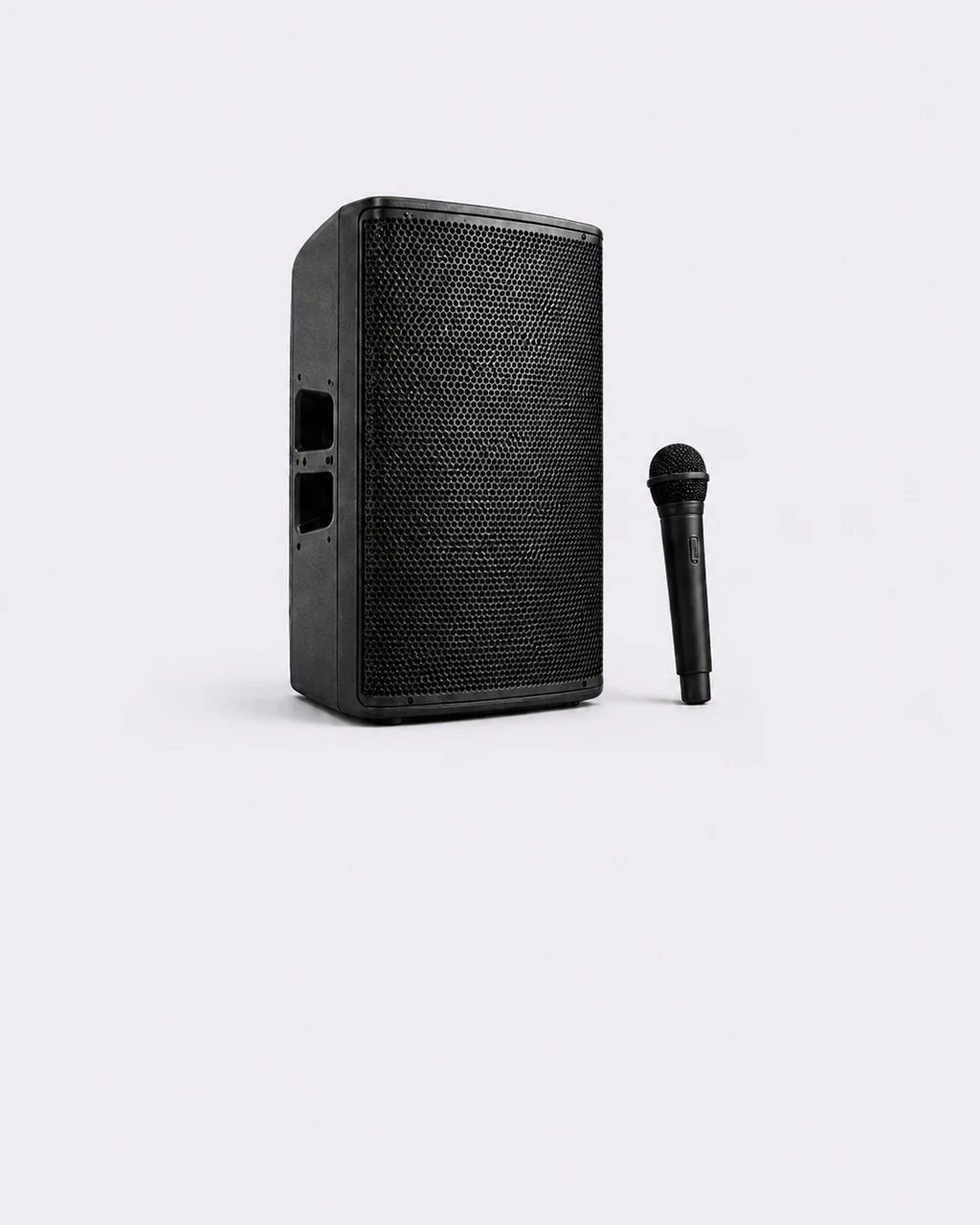 Black loudspeaker and wireless microphone against a light grey-purple background