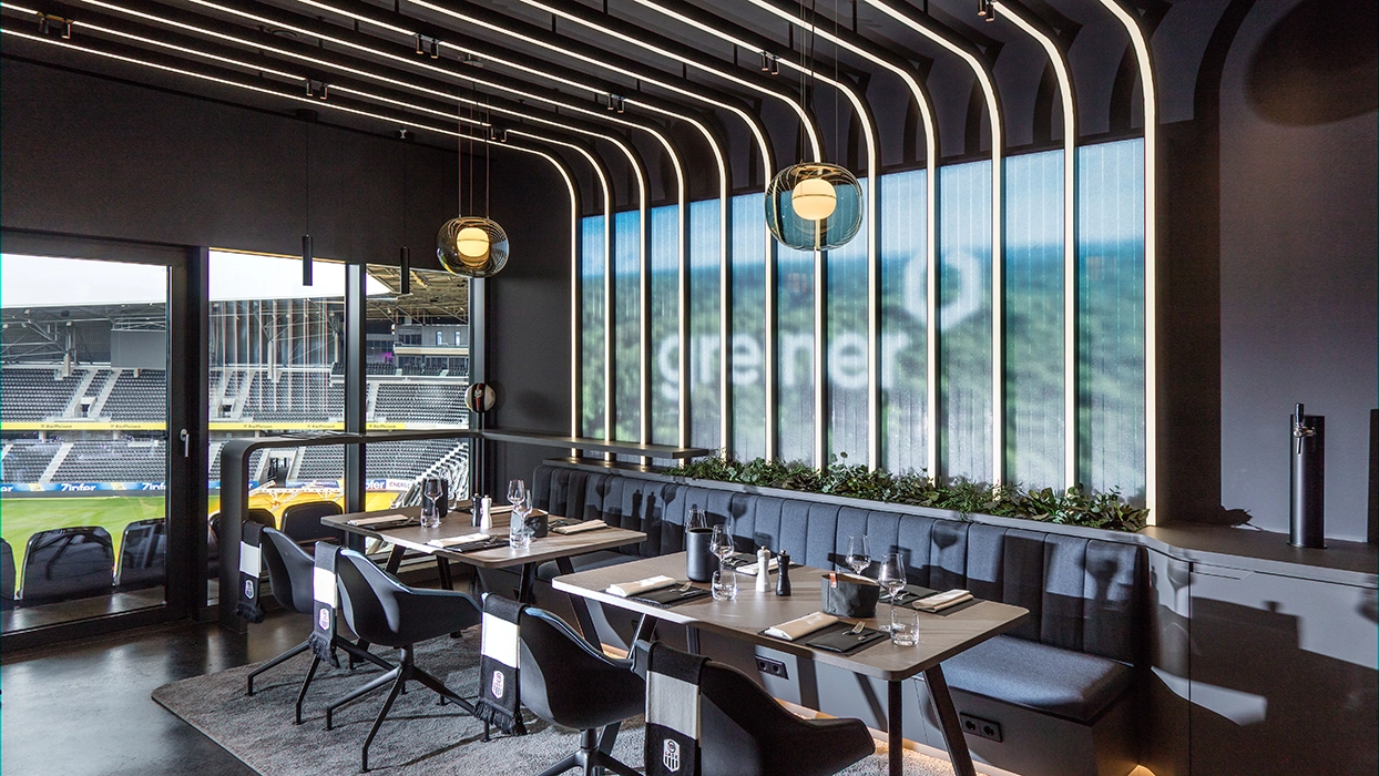 LED wall in the Greiner hospitality suite overlooking the football stadium in Linz.