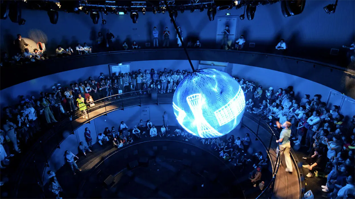 Illuminated LED sphere between the visitor levels in the German Pavilion at Expo Shanghai.