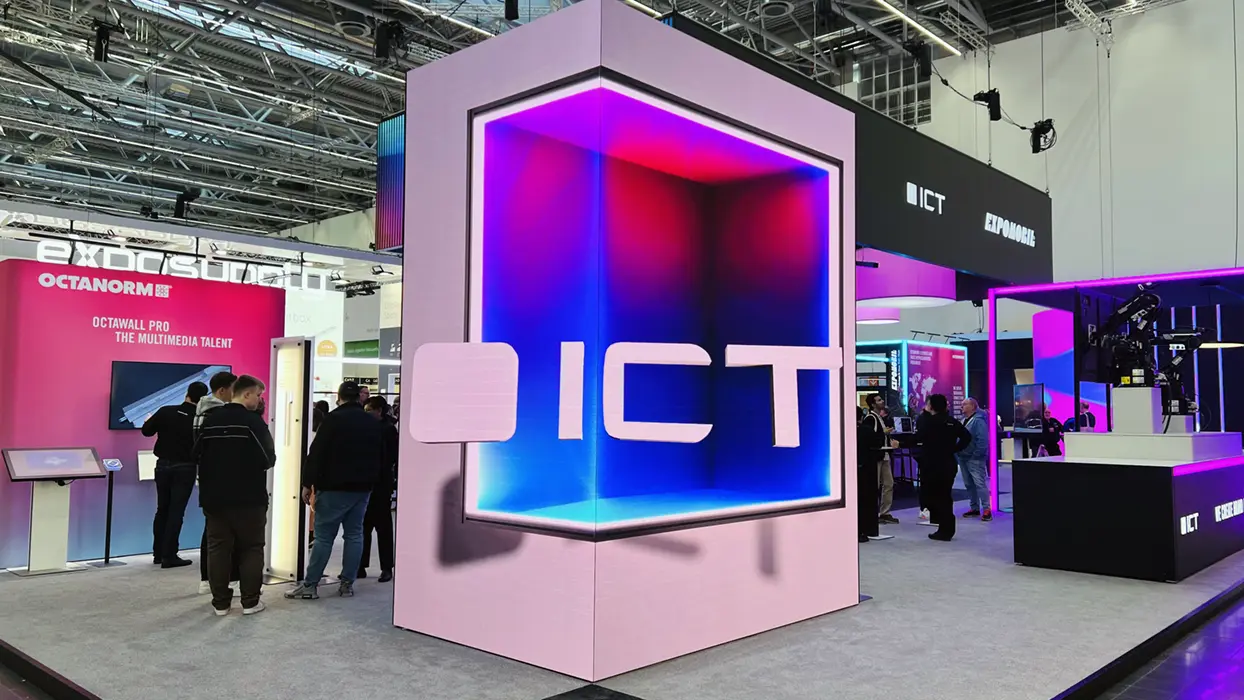 LED surfaces arranged around a corner to create a sense of depth at ICT's EuroShop stand.