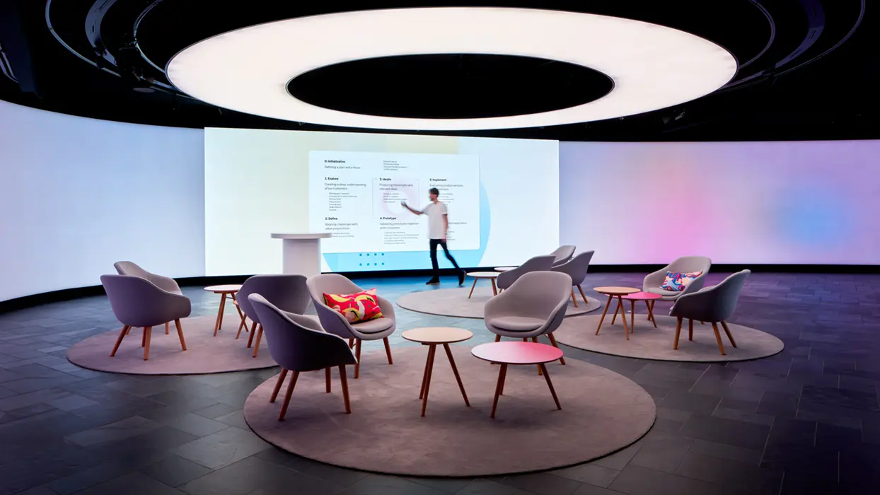T-Gallery event space with three screens, view 2