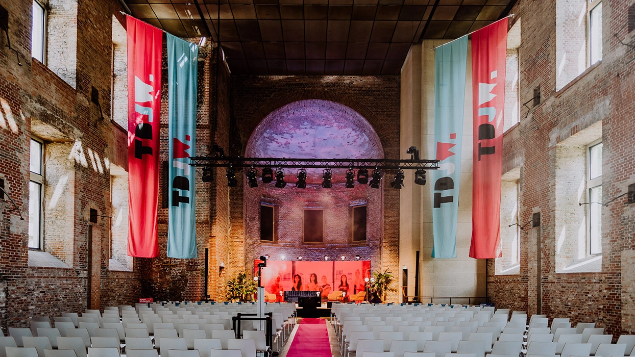 Wedding ceremony in front of an old brick building, view 15