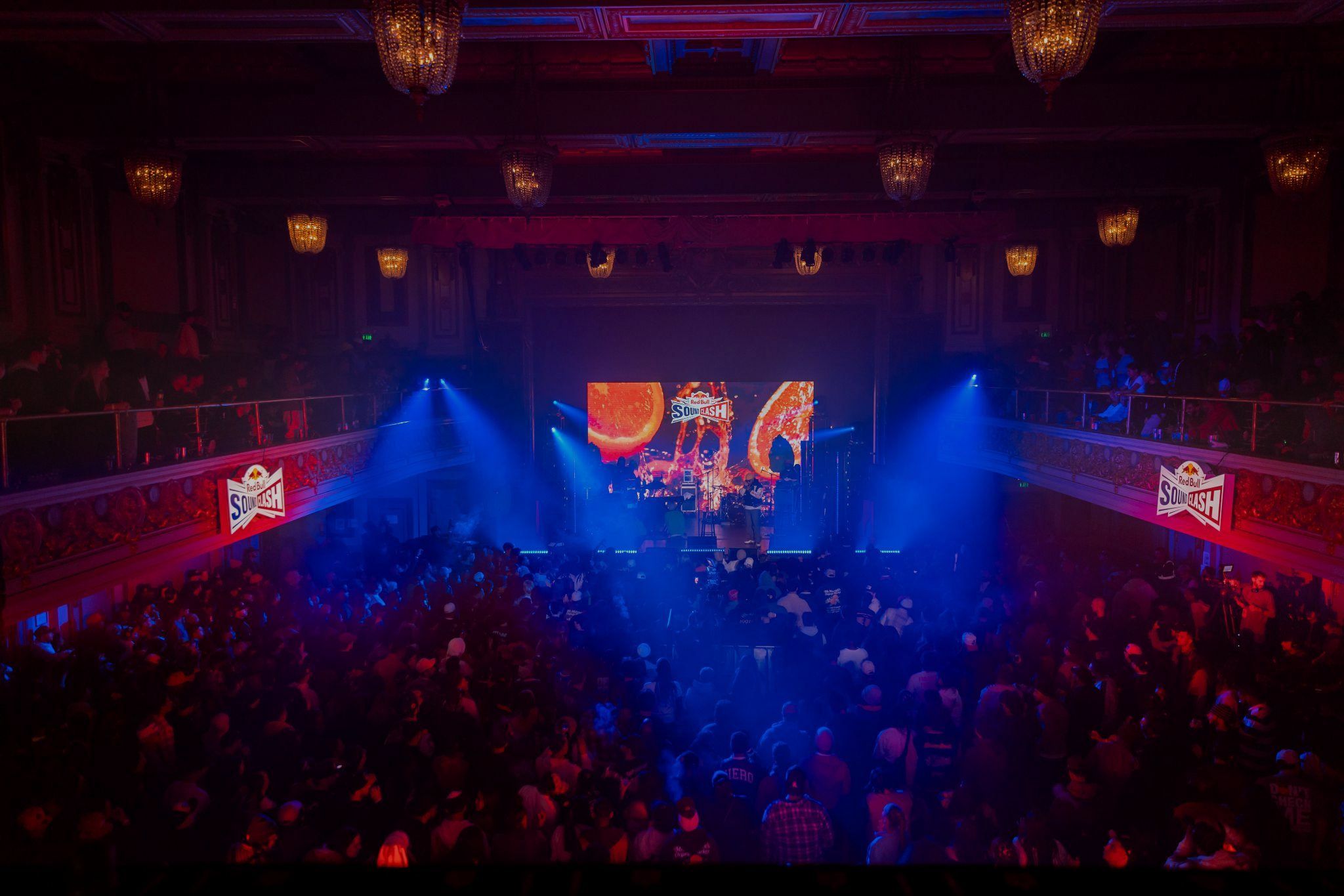 Packed theater and stage lit in blue at Red Bull Soundclash San Francisco