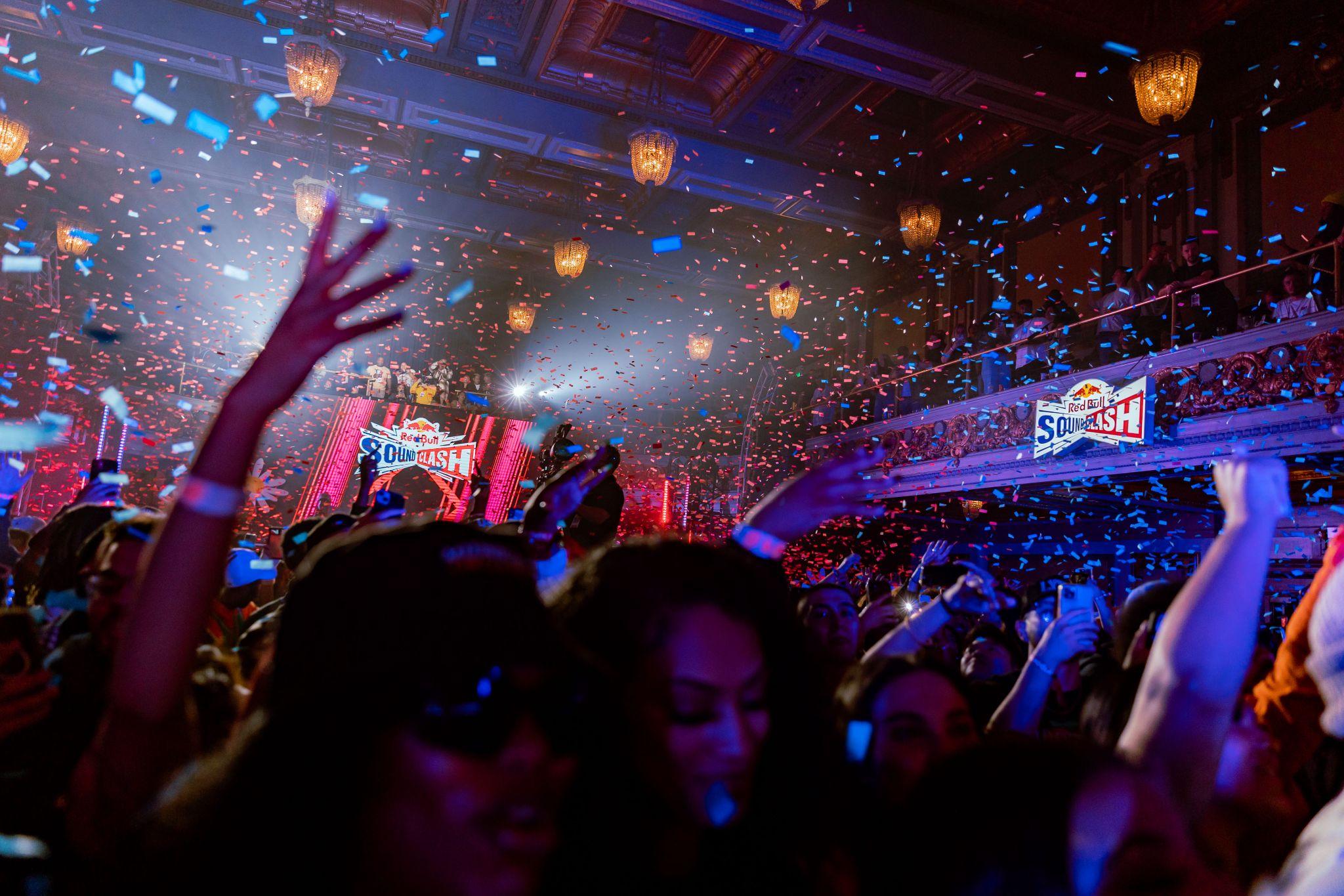 Confetti falls over the crowd inside the theater at Red Bull Soundclash San Francisco