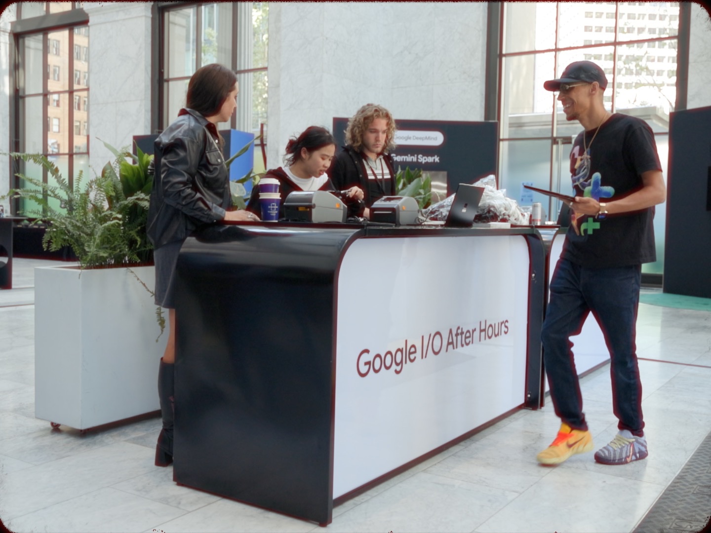 Guests check in at the Google I/O After Hours registration desk