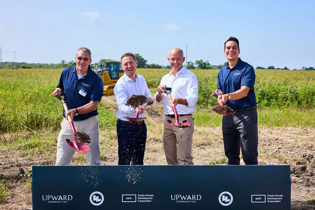 Four Upward Communities and public partner principals turning the first soil with ceremonial shovels at the Wildflower Lockhart site