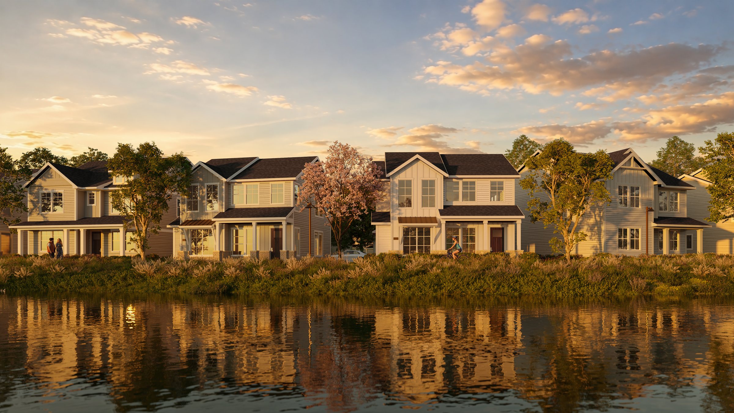 Rendering of two-story Wildflower homes overlooking the community pond at sunset