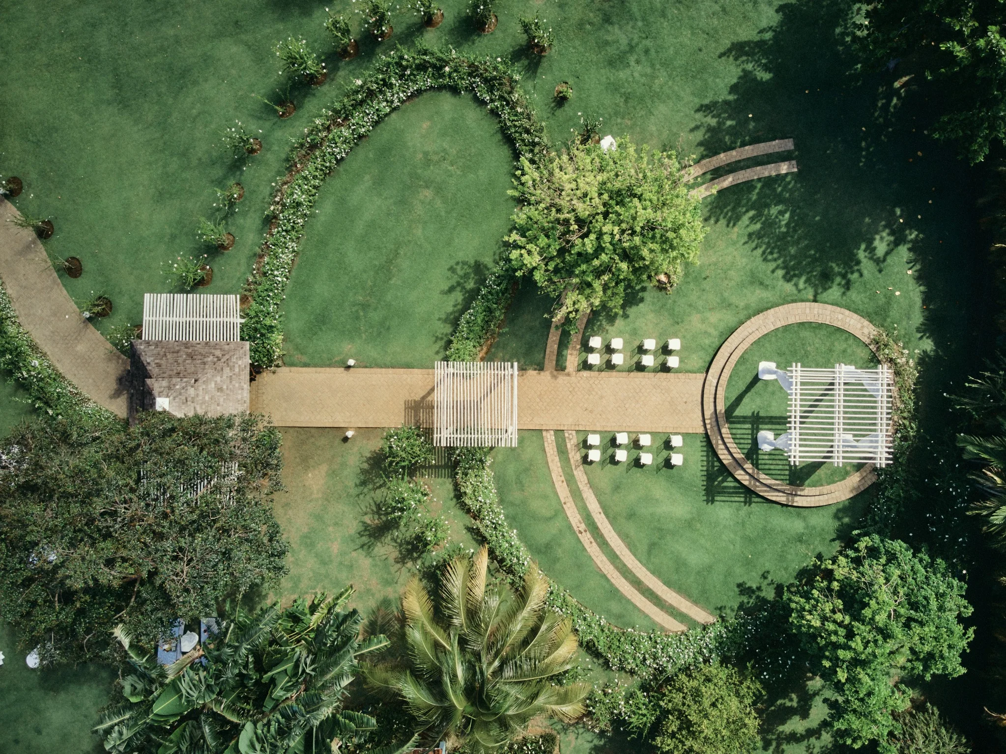 Aerial view of an intimate garden wedding ceremony in Jamaica