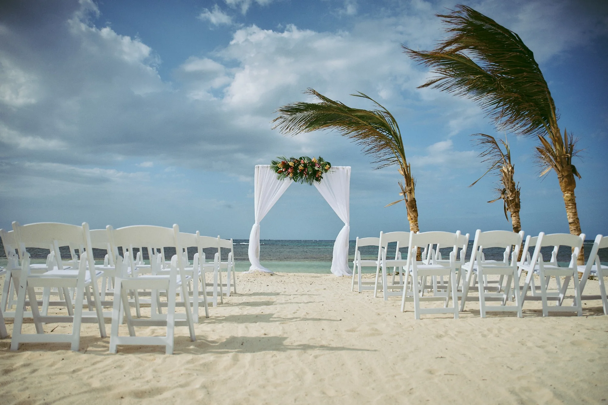 Aerial view of an intimate garden wedding ceremony in Jamaica