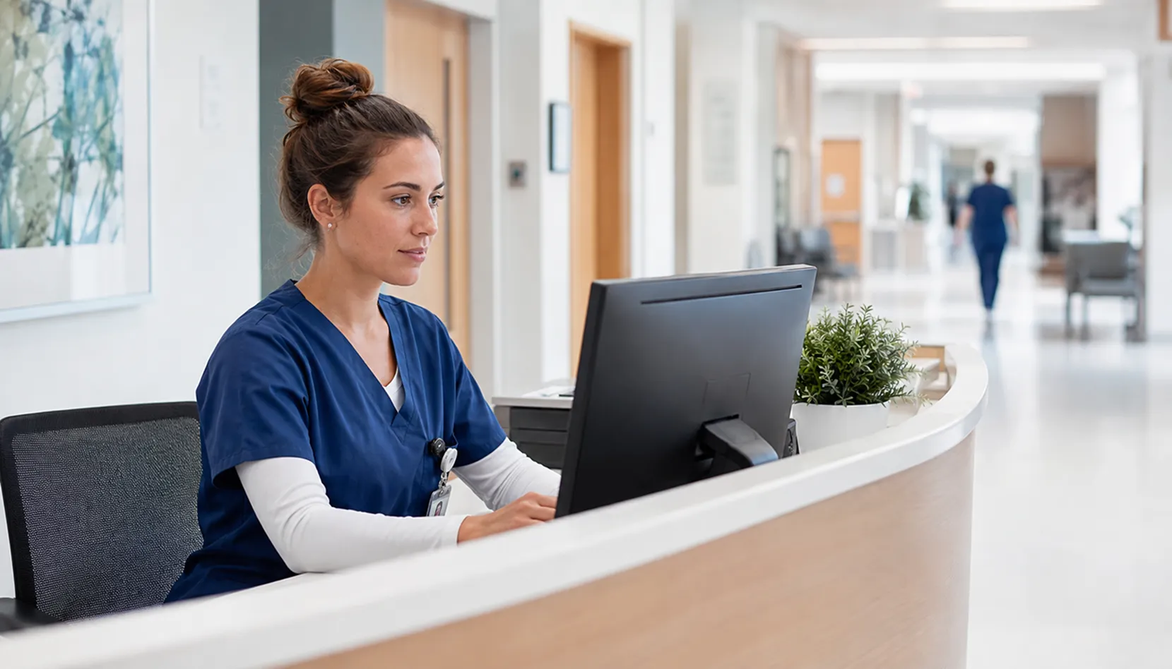 Healthcare staff using secure business technology and email systems