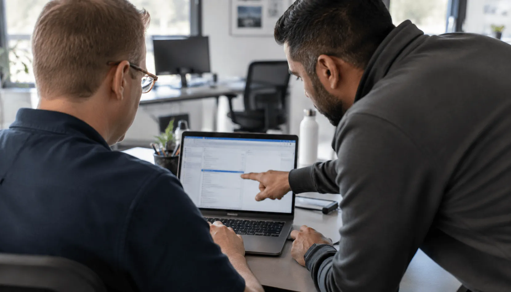 IT technician providing on-site support for a business workstation