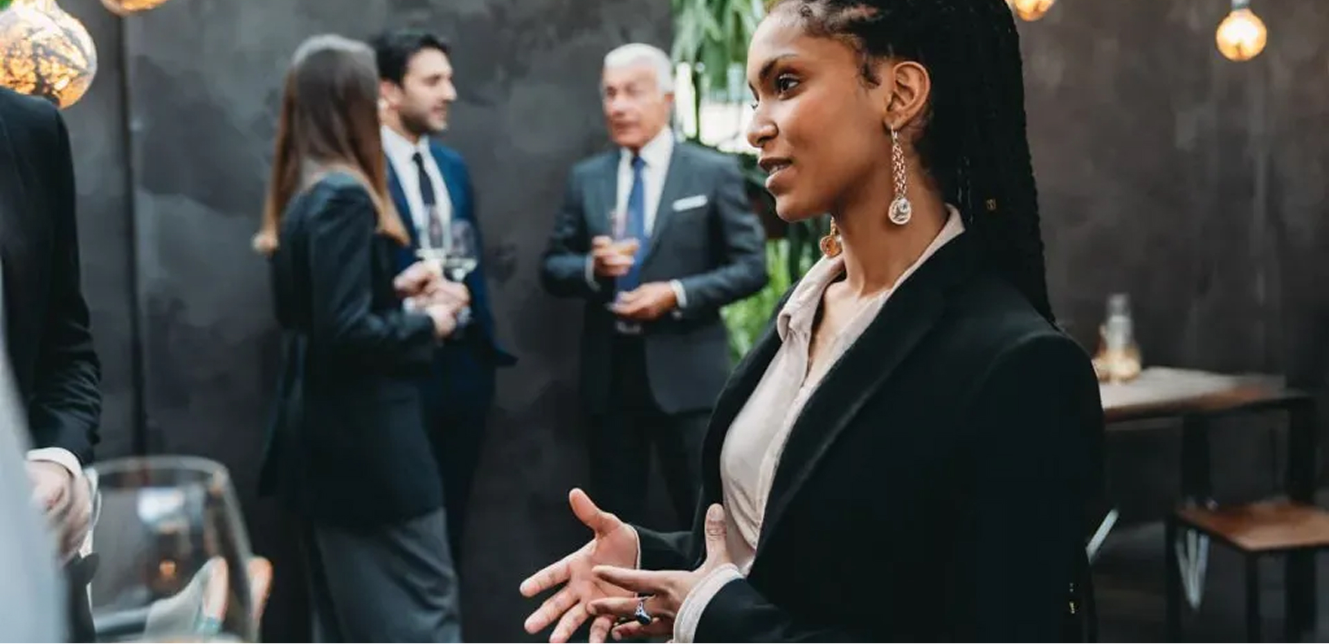 NorthRock advisors in conversation at an evening event