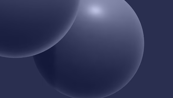 Close-up of two smooth, overlapping dark blue spheres on a matching dark blue background with subtle lighting highlights.