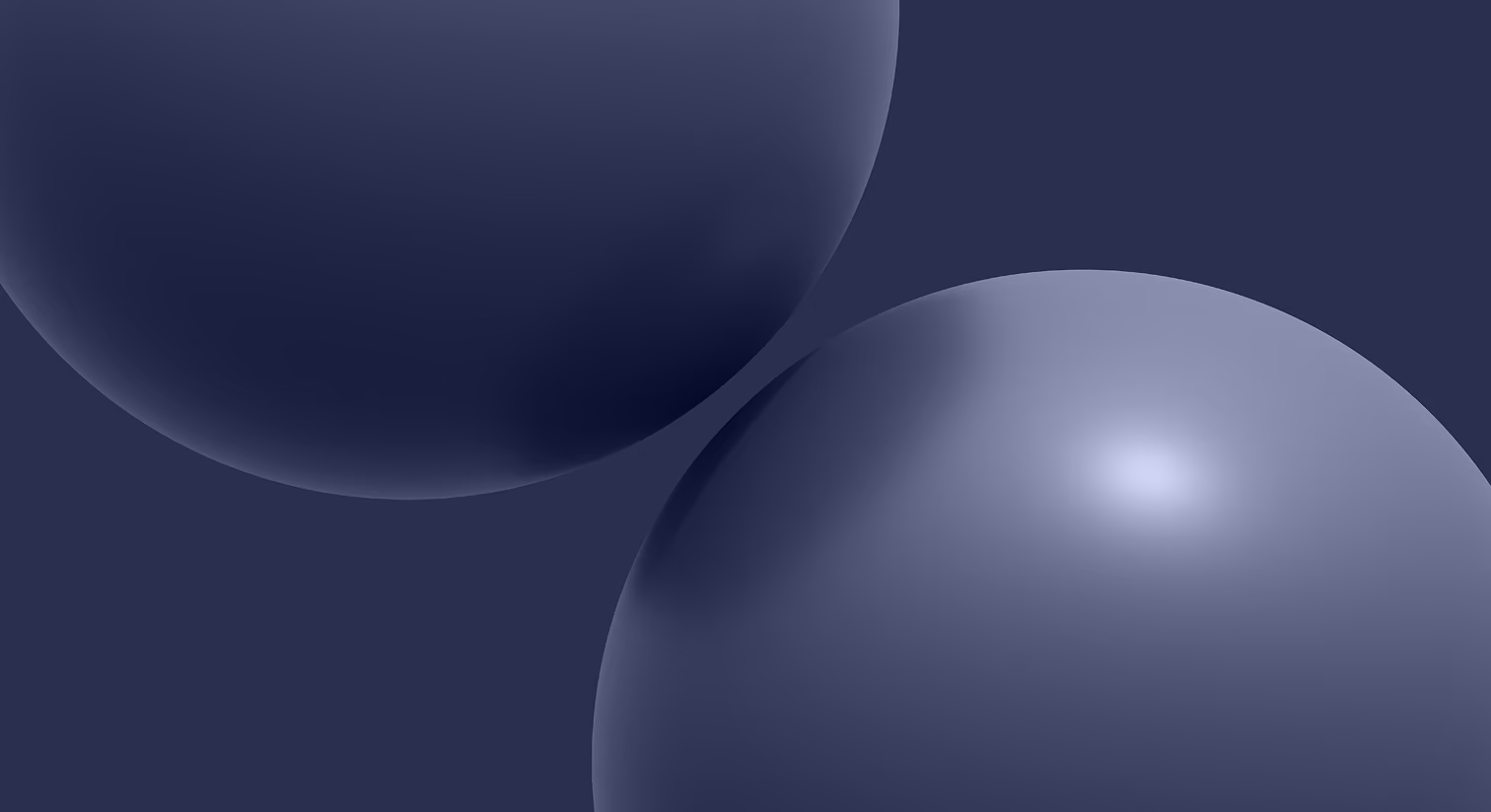Two large, smooth, dark blue-grey spheres against a matching dark blue-grey background with soft lighting reflections.
