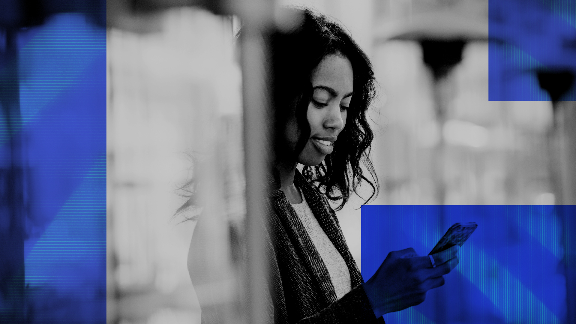A woman checking her net position on her phone