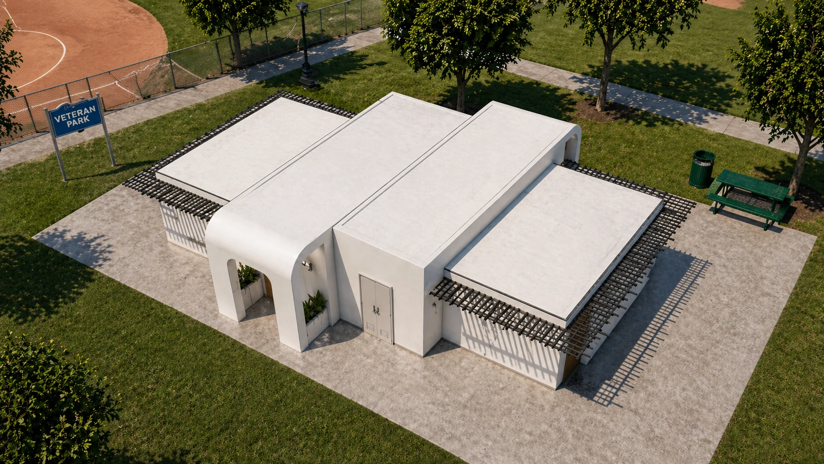 Aerial architectural rendering of the proposed Veterans Park restroom and storage building in Bell Gardens, showing white roof forms and perimeter shade screens.