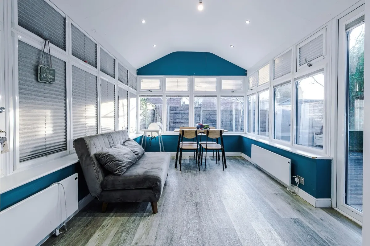A bright garden conservatory in a Clayton short-let managed by Kammili Properties
