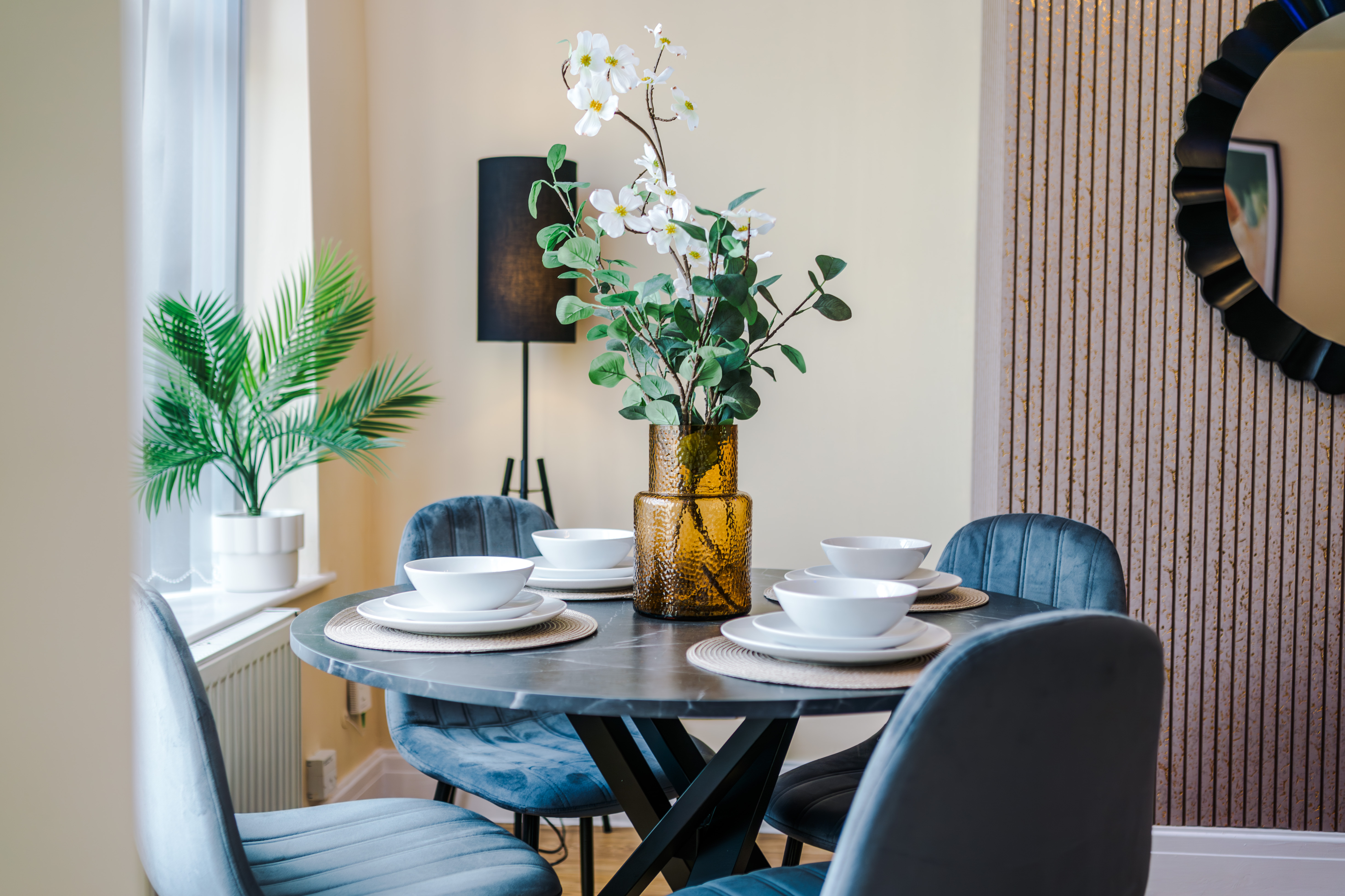 A bright, professionally styled short-let living room managed by Kammili Properties