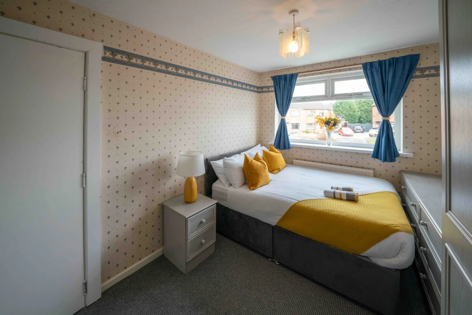 Second double bedroom with a street-facing window at Old Vicarage in Westhoughton, Bolton