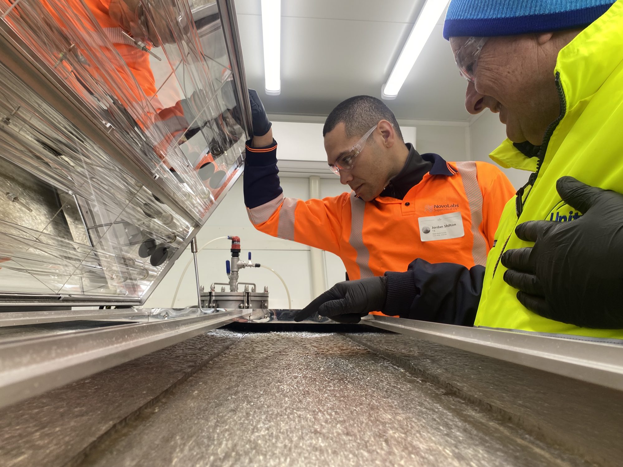 Operators inspecting the treatment channel
