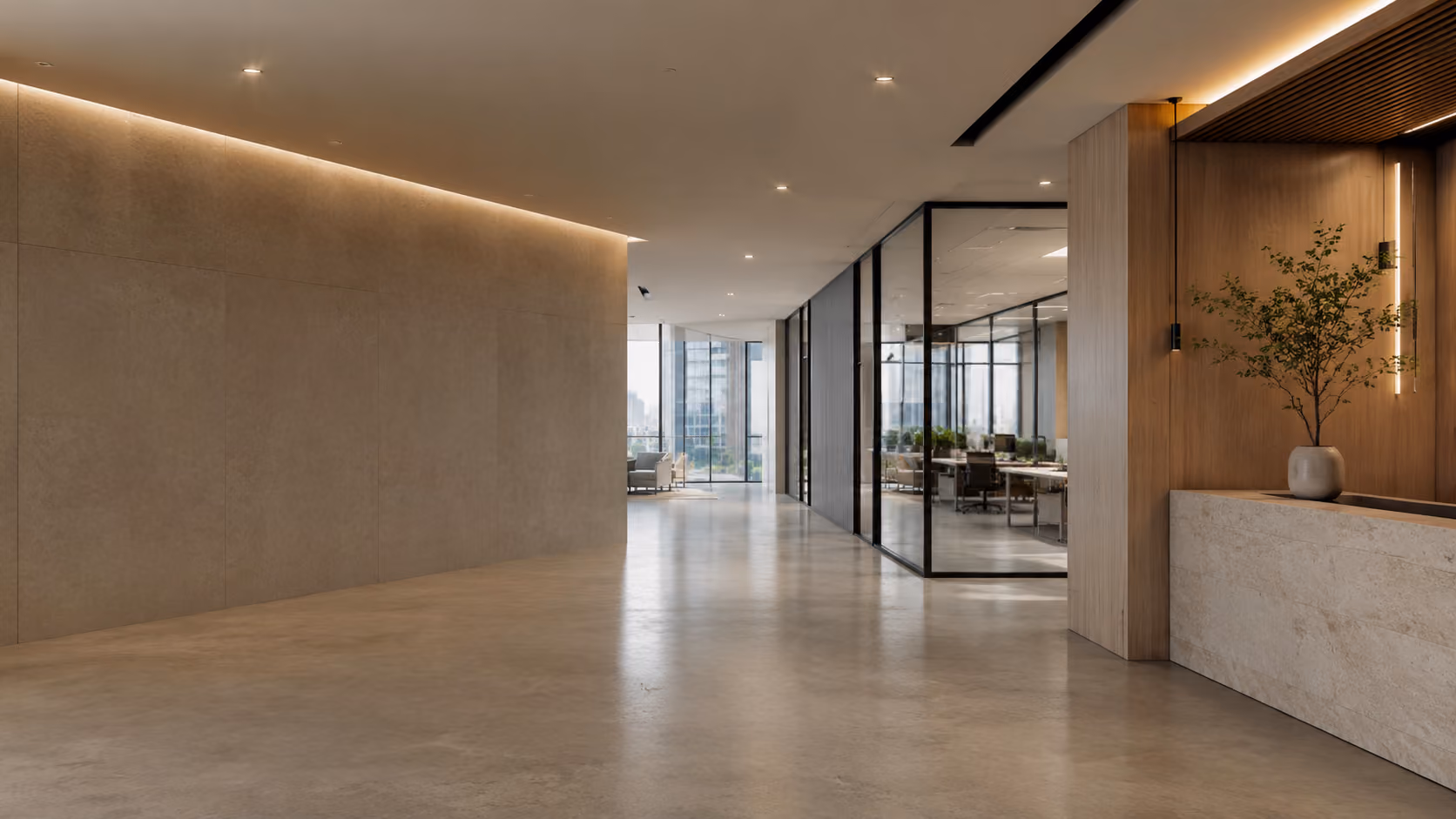 Modern office hallway with polished concrete floor, glass-walled meeting rooms, and a plant on a stone reception desk.