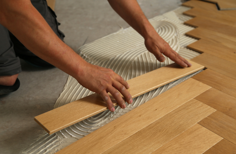 Flooring choices and their effect on bathroom renovation cost estimates.