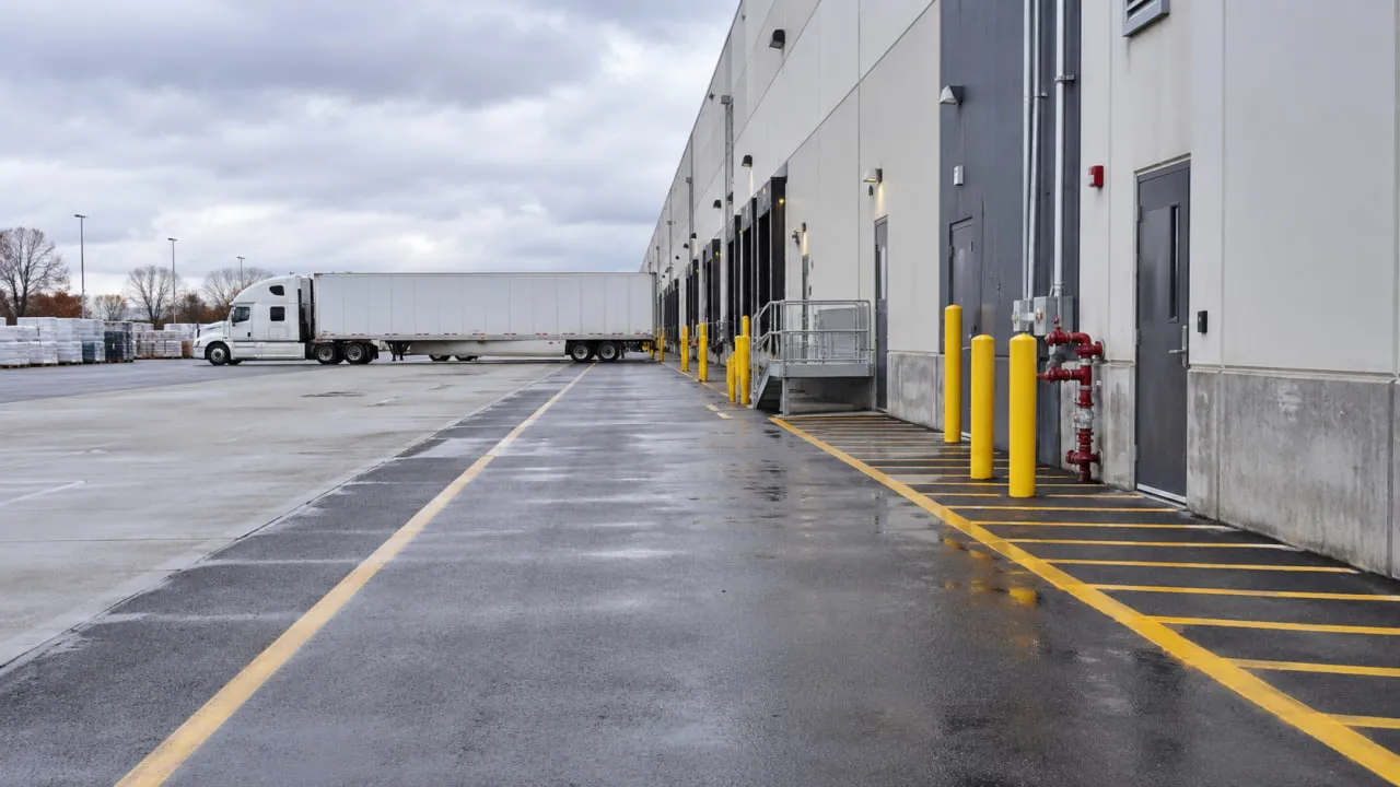 Truck turning path planned around the design vehicle at a warehouse loading dock