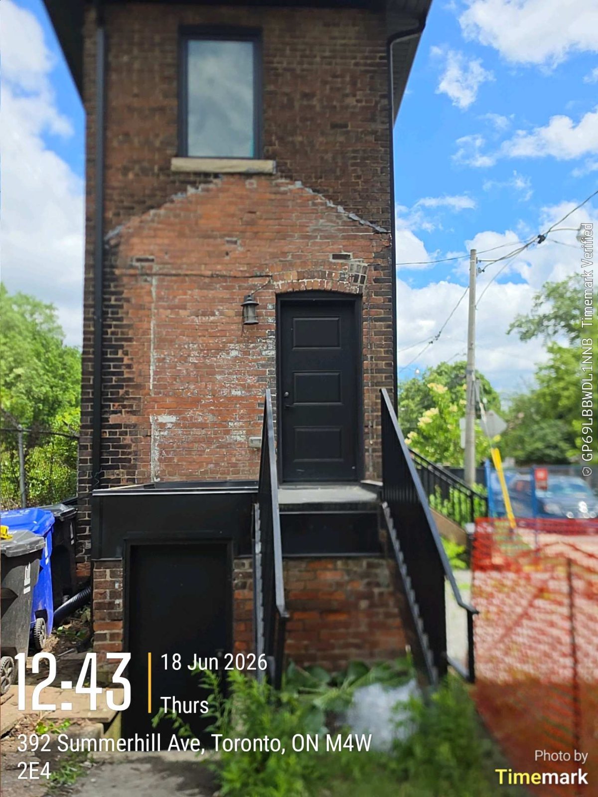 Existing rear brick structure behind a Toronto home before the addition