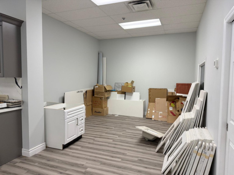 Back room being cleared during the medical clinic strip-out