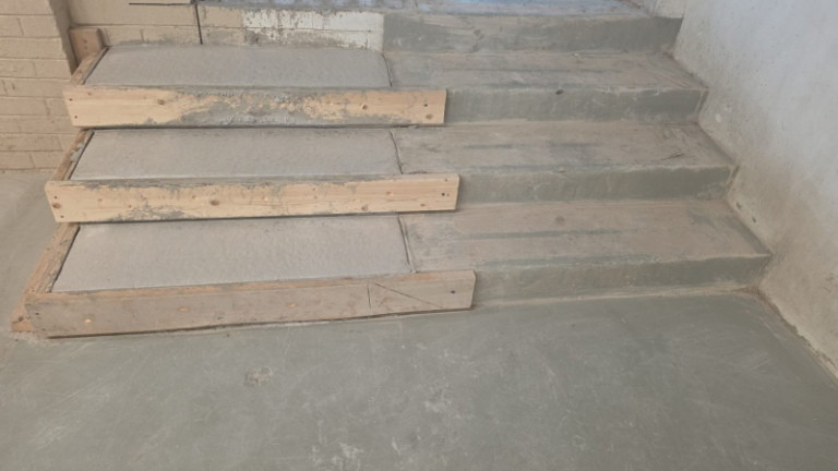 Wood formwork for new concrete steps inside a Scarborough commercial facility