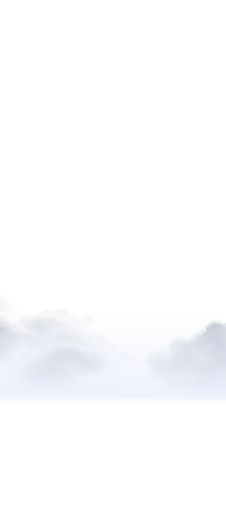 Soft white clouds floating against a bright blue sky background.