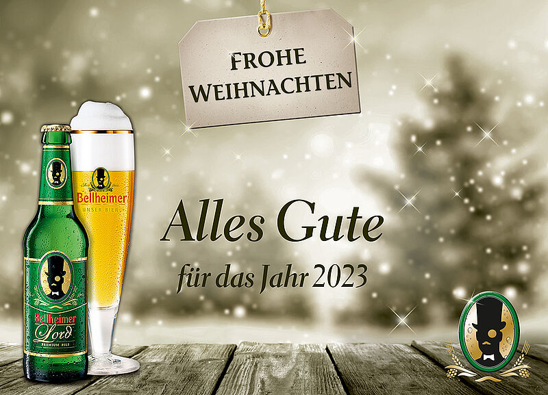 Weihnachtsgruß der Bellheimer Brauerei mit Flasche und Glas Lord Pils vor verschneiter Winterlandschaft