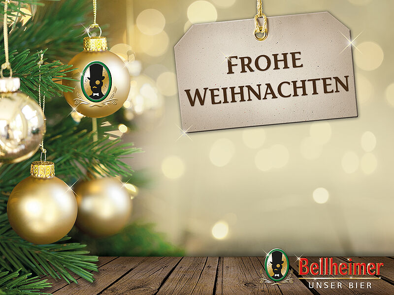 Weihnachtsgruß der Bellheimer Brauerei mit Christbaumkugeln am Tannenzweig