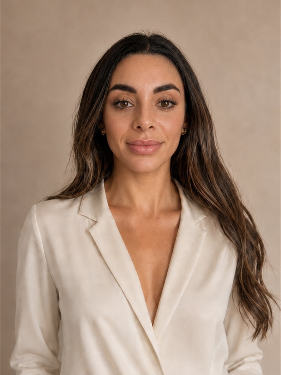 Lucy Bannister, founder of doubleseven, in a cream blazer against a neutral backdrop.