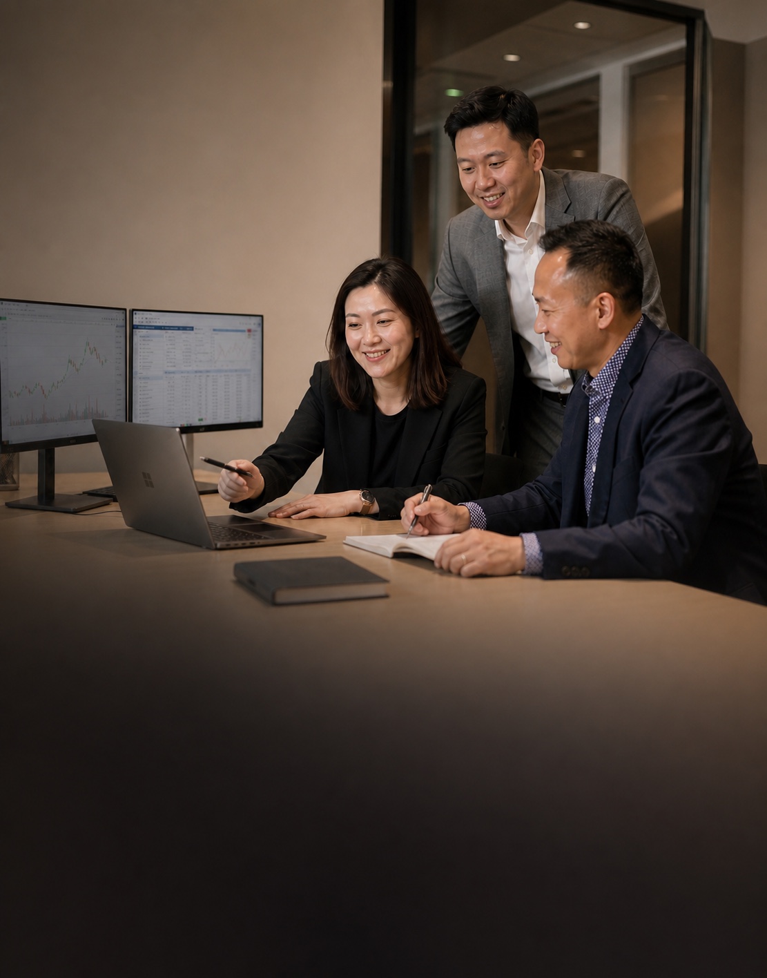 Meridian Energy office trading team on mobile