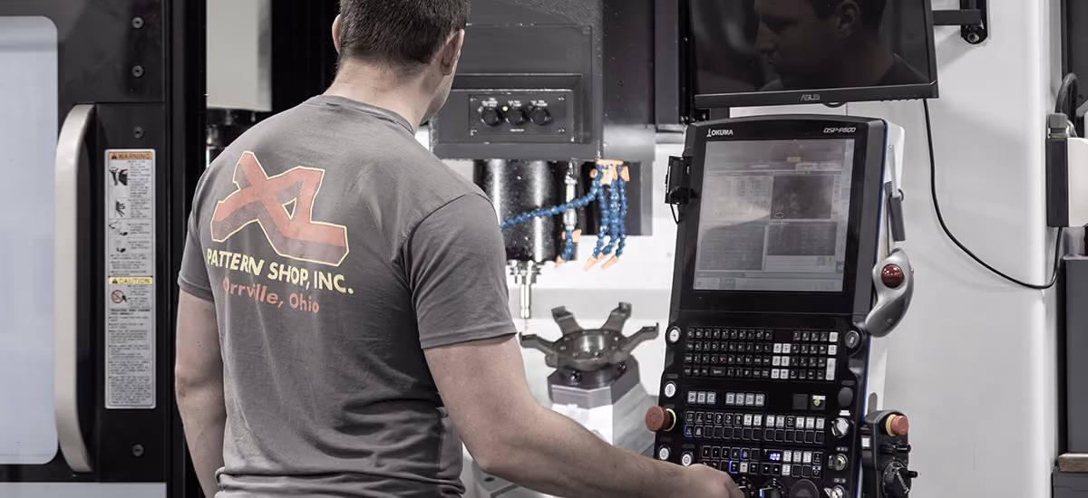 XL Pattern Shop machinist operating an Okuma CNC mill at the Orrville, Ohio manufacturing facility.