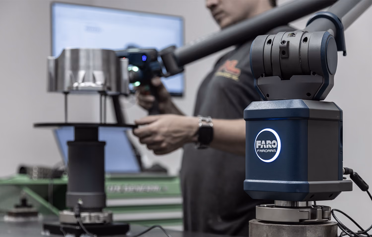 XL Pattern Shop technician using FARO 3D scanning equipment to reverse engineer a precision-machined component.