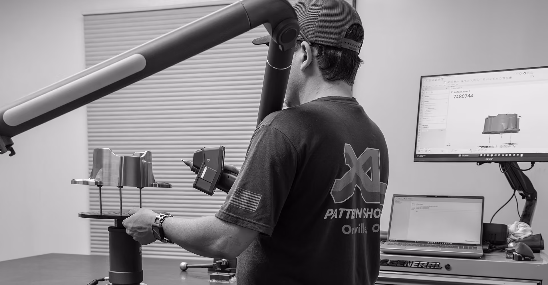 XL Pattern Shop technician using 3D laser scanning equipment to reverse engineer a precision-machined component.